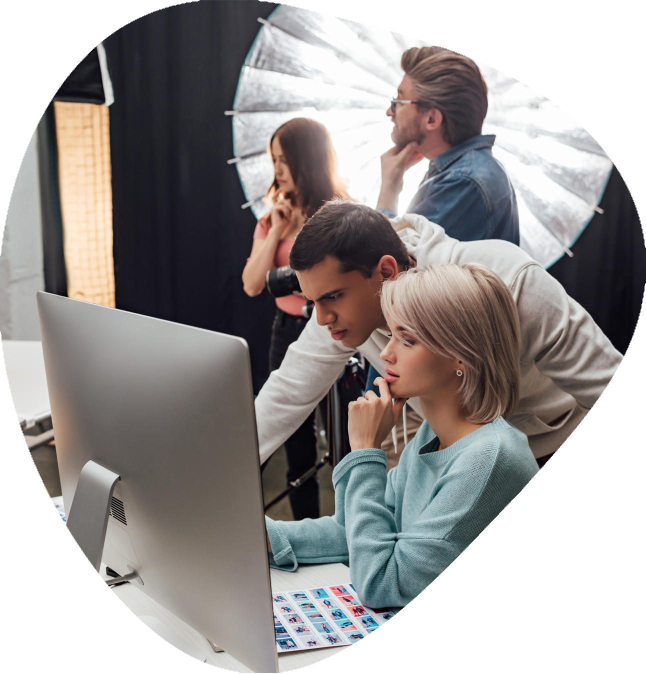 Selective focus of coworkers looking at computer